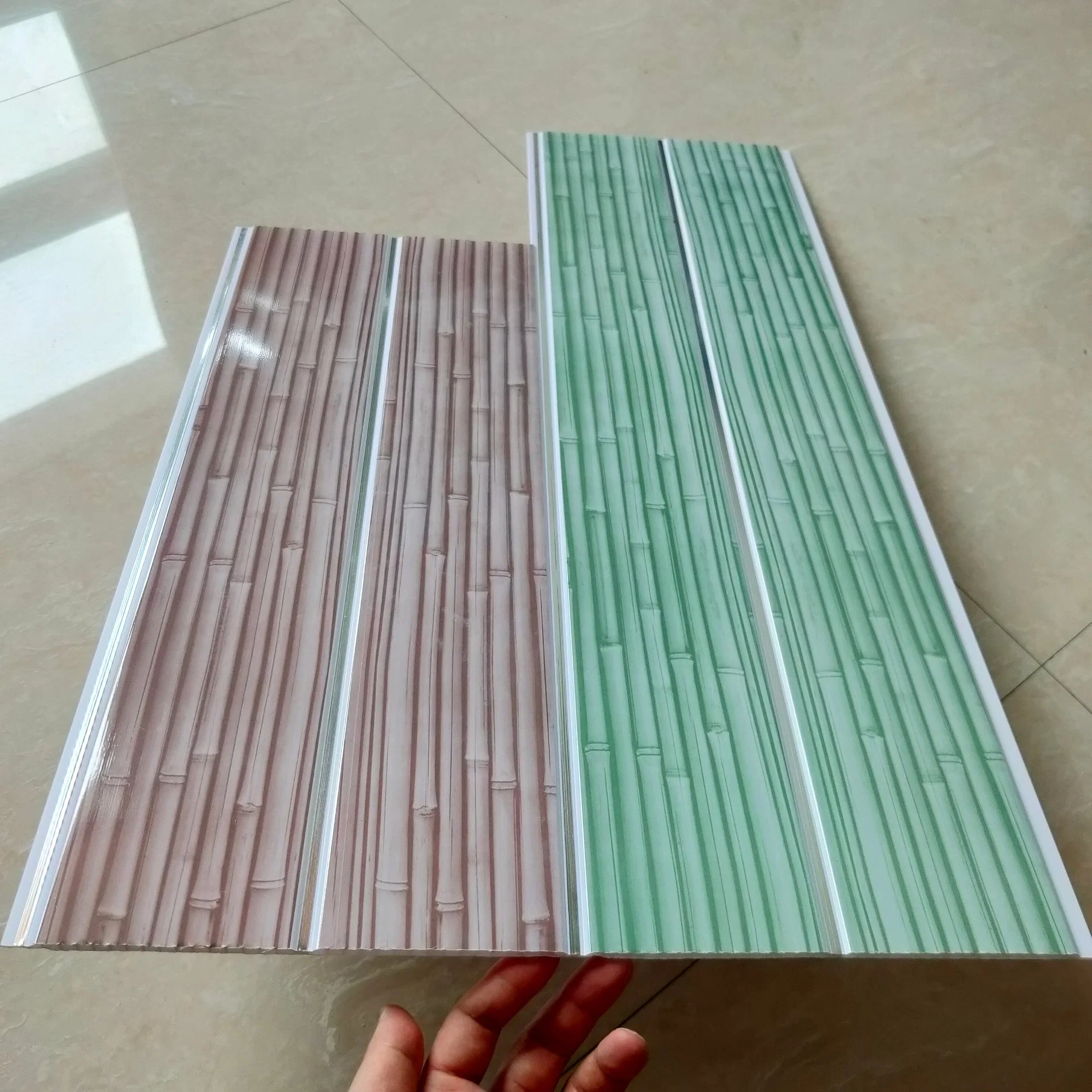 Precios baratos de bambú de peso ligero Diseño de impresión en color Panel del techo de PVC material de construcción