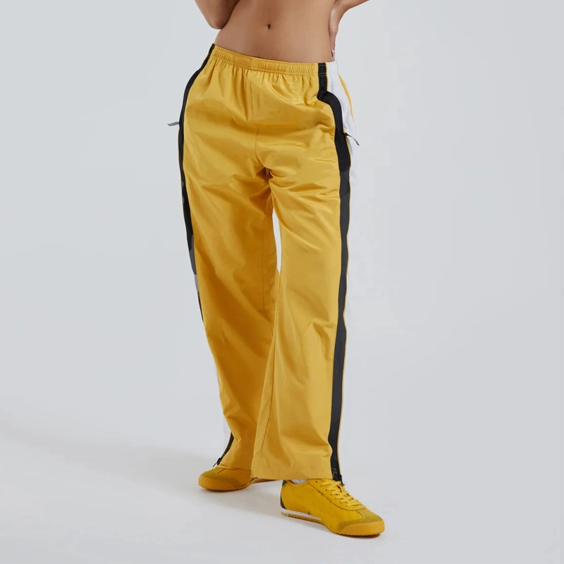 Pantalon de sport léger à blocs de couleur pleine longueur avec logo personnalisé pour femmes.