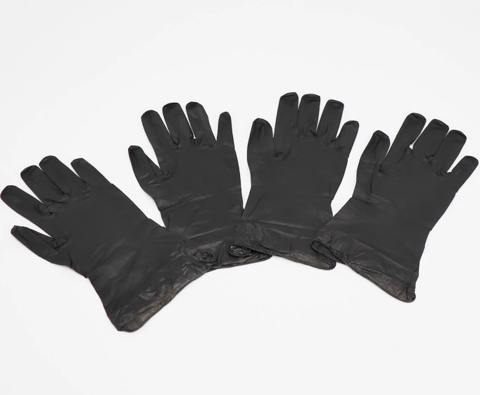 Examen de sécurité en latex de vinyle jetable en poudre transparente Gants de protection