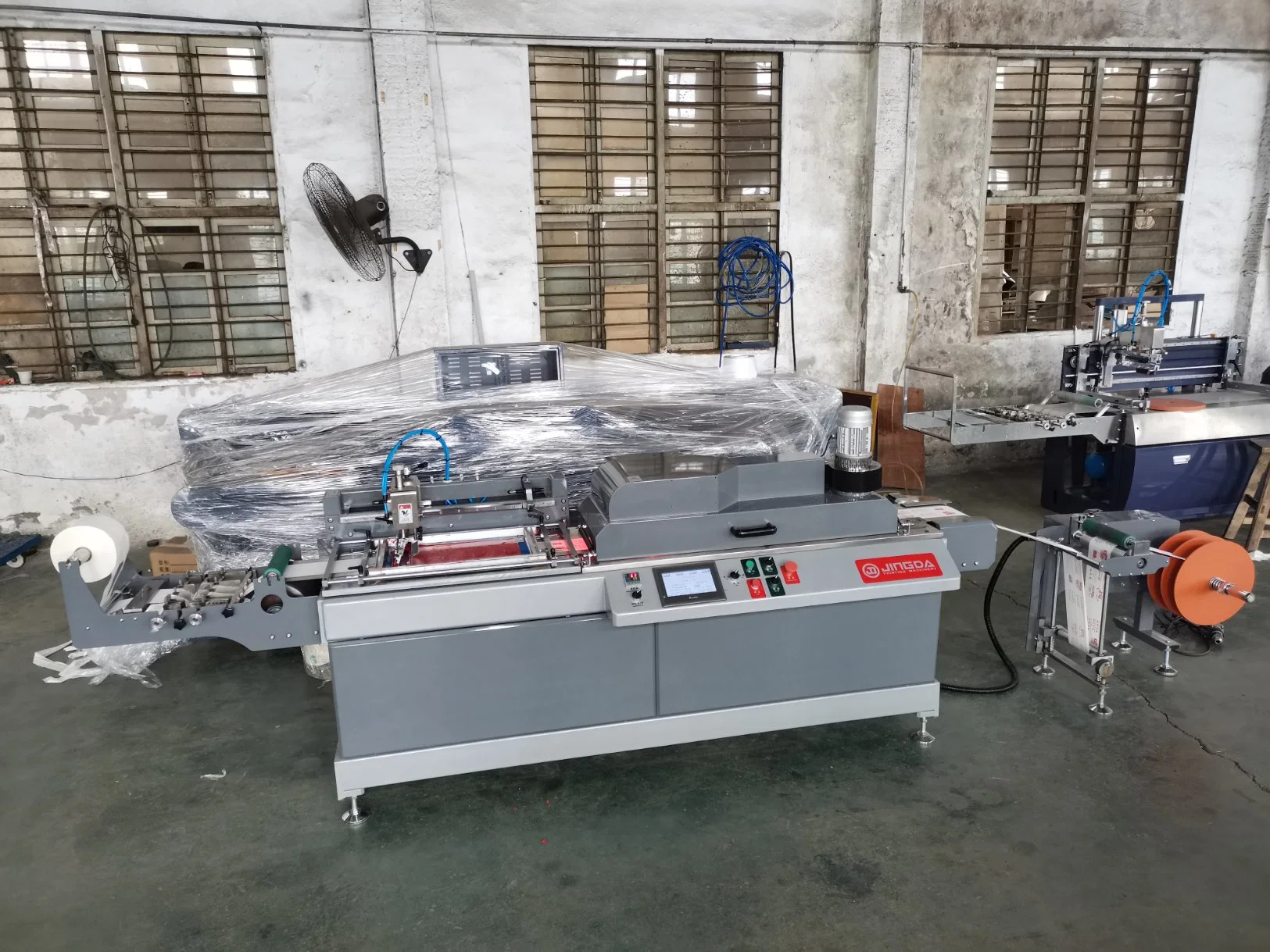 Roll to Roll Fully Automatic Clothing Label Screen Printing Machine for Polyester Satin Ribbon, Cotton Tape, Lanyard, PU Tape and Heat Transfer Label Jdz-2001