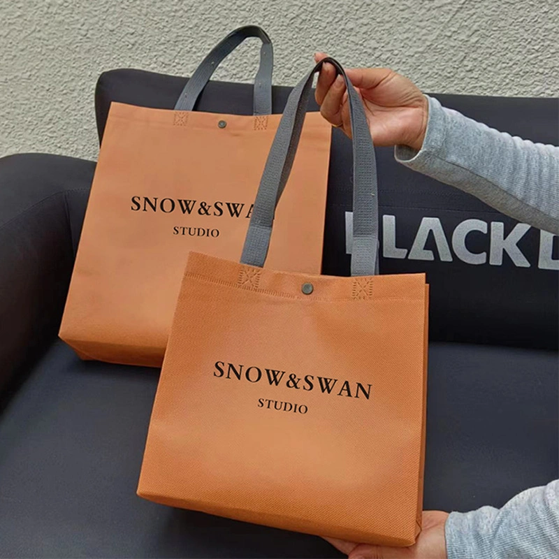 Customized Ecological Biodegradable Convenient Concealed Button Clothes Accessories Garment Gift Grocery Packaging Hot-Press Fabric Tote Non-Woven Shopping Bag