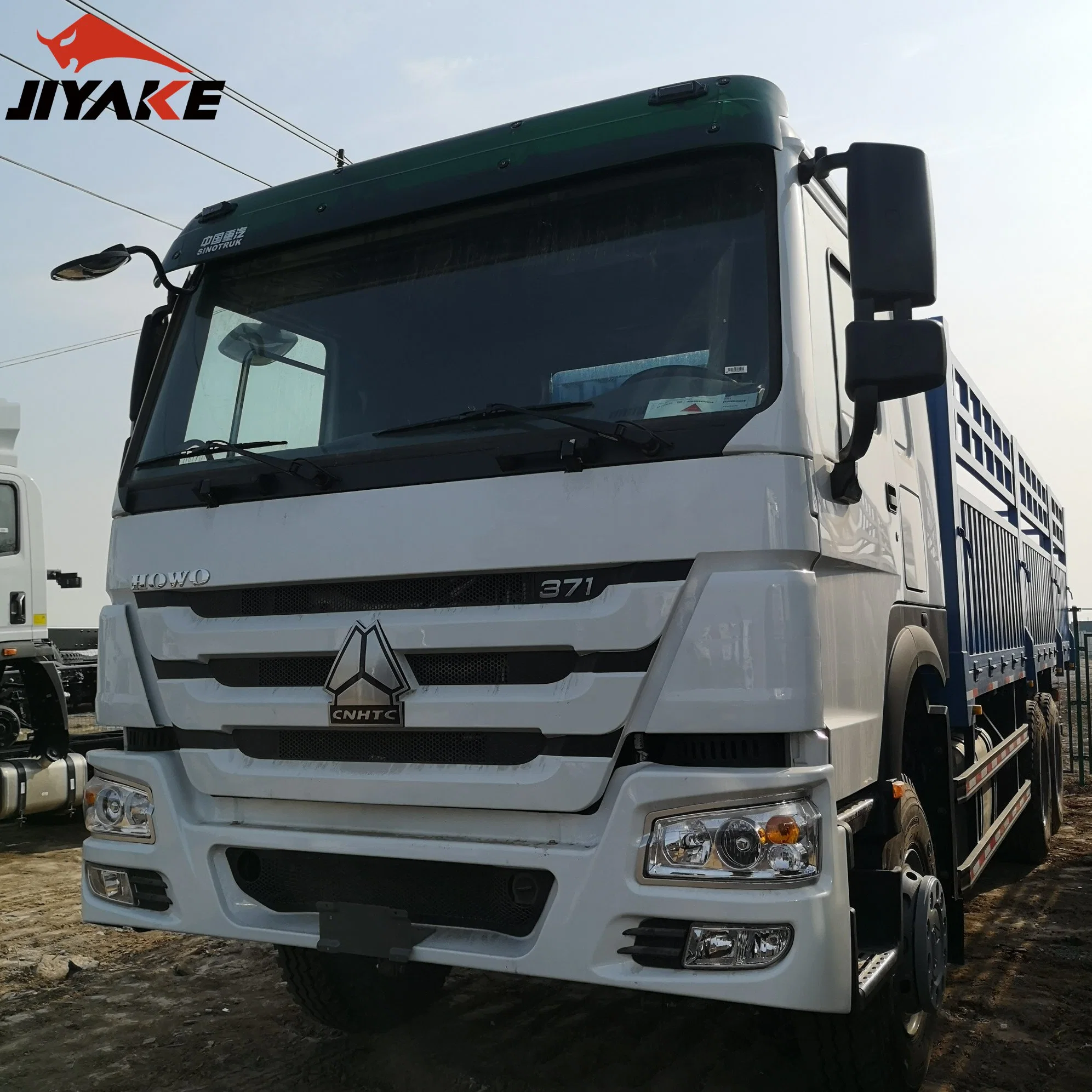 Usado/Nova Parede Lateral HOWO semi reboque do veículo em movimento empurrador placa plana Dropside Van camião veículo veículo de carga geral para o mercado africano