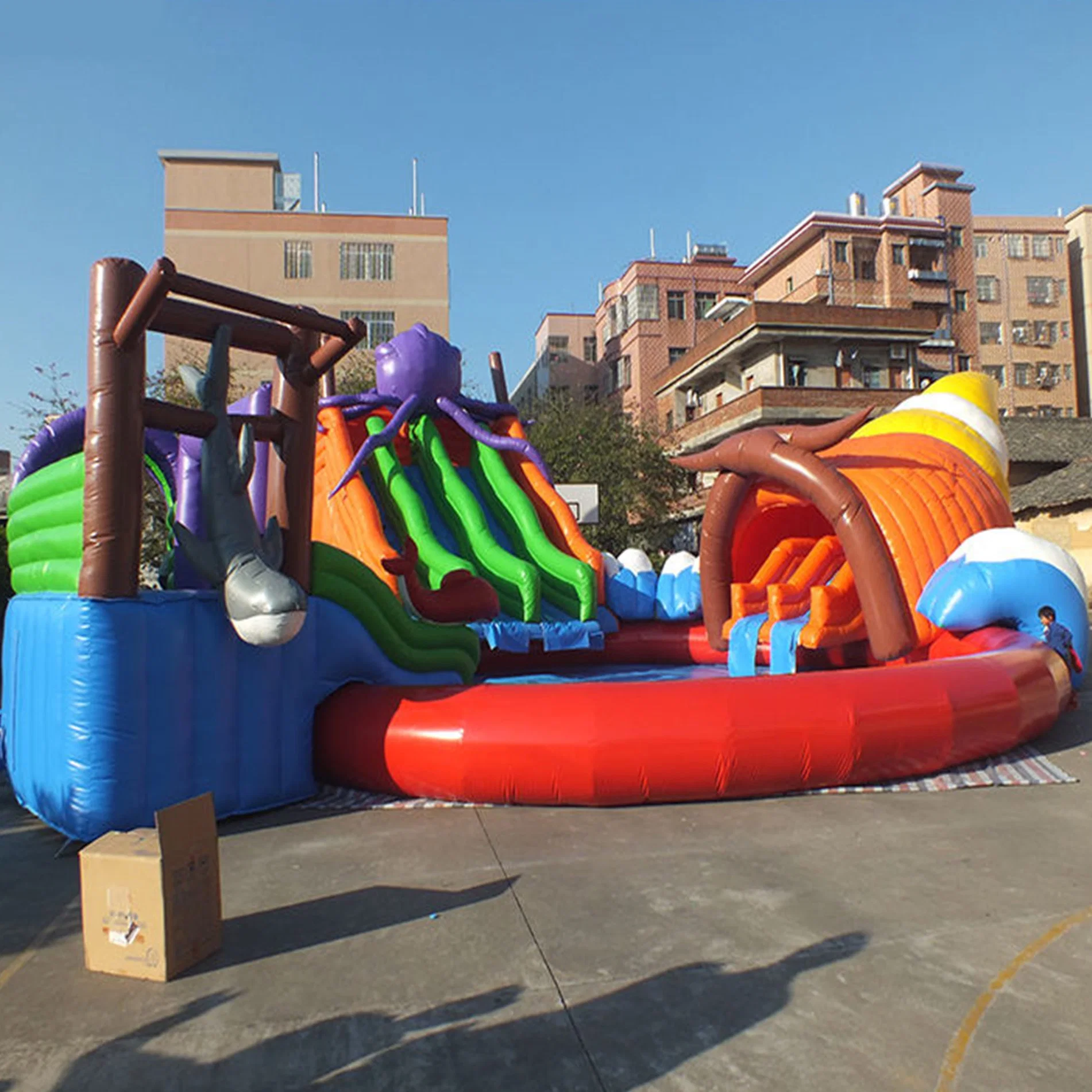 2024 Atracciones calientes al aire libre de diversiones Tierra Móvil Comercial enorme Inflatable Parque acuático para niños y adultos