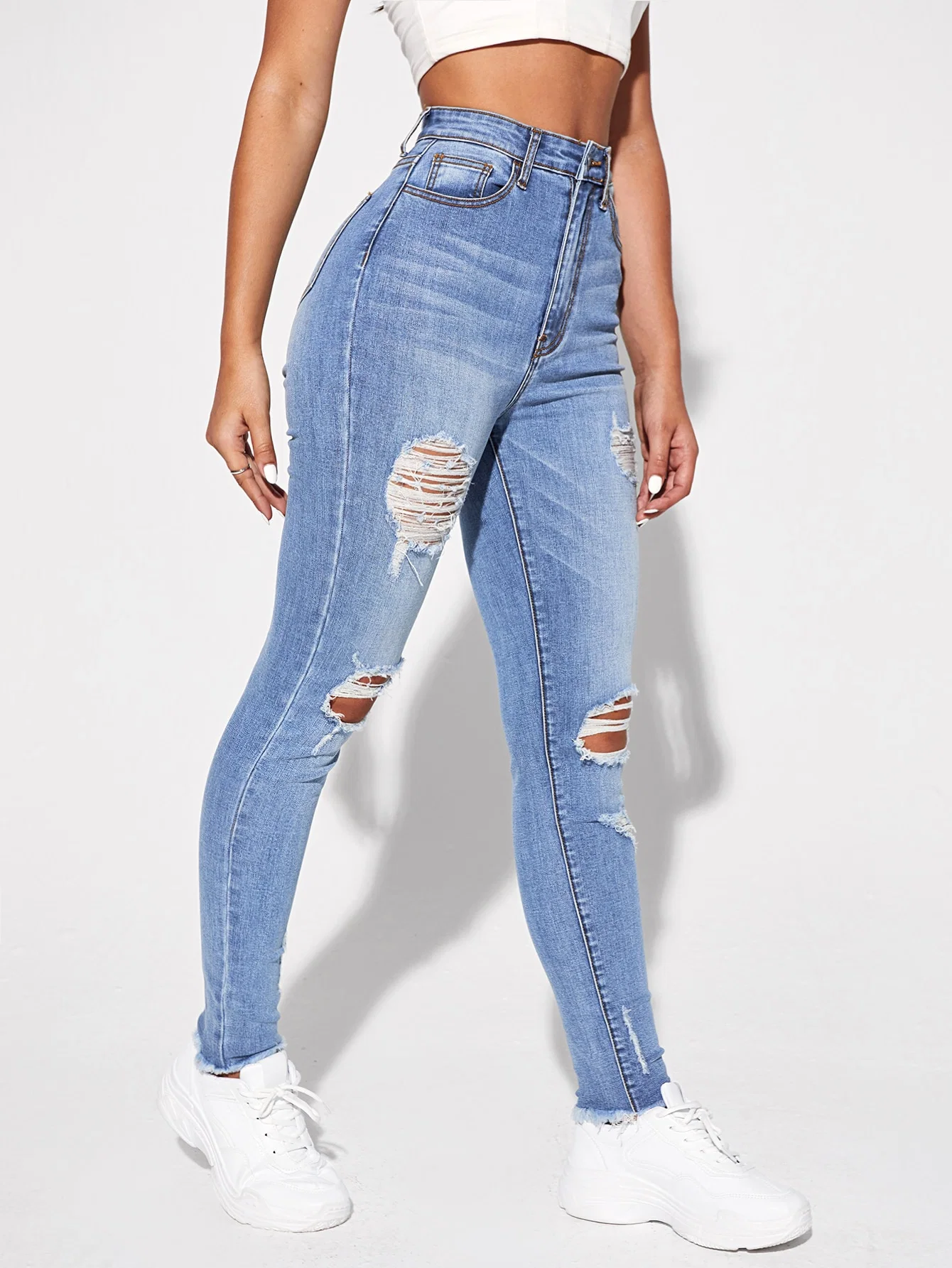 New Fashion Lady Jeans High Waisted Scratch Holes and Raw Edge Bottom Hem Stretch Quality OEM&ODM Slim Fitting Jeans