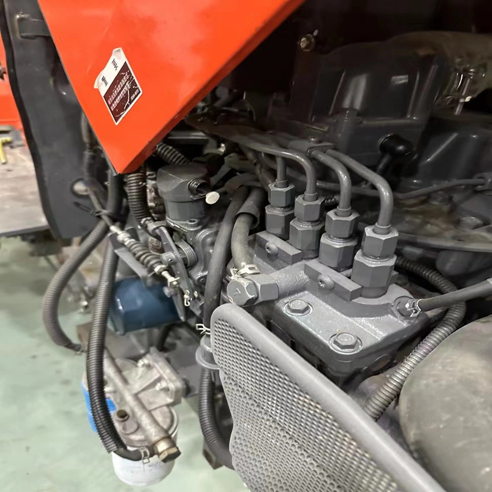 Utilisé un tracteur à pied compact Kubota M854K d'occasion avec charrue