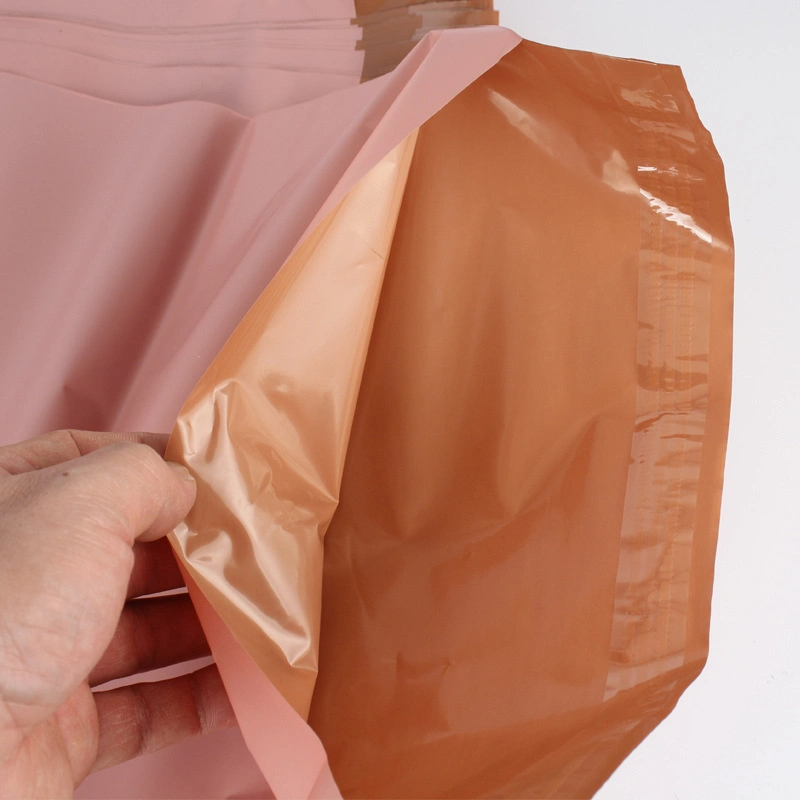 Commerce de gros logo personnalisé Laser autoadhésif Mailers indéchirable plastique sac sacs d'envoi d'expédition de courrier pour les vêtements Téléphone