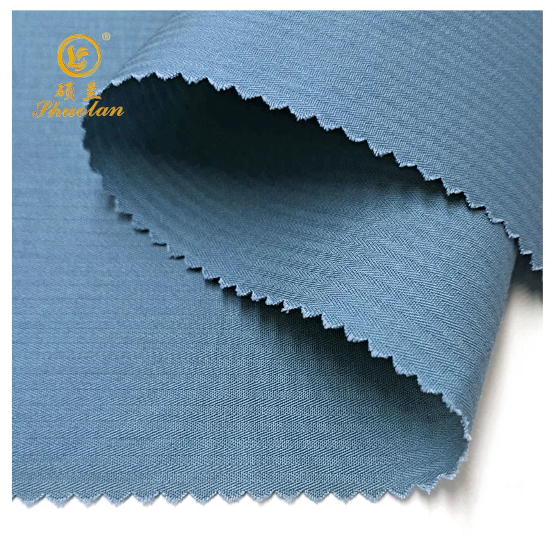 T/C 65/35 45*45 110*76 Espina de Pez teñido de un sólido de color azul marino liso tejido tejido de revestimiento de bolsillo de tela teñido de textiles