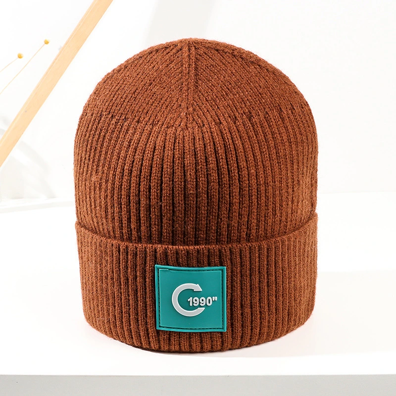 2022 New Wholesale/Supplier Leather Label Decoration Warm Winter Knitted Beanie Hats Keep Warm Ski Cap