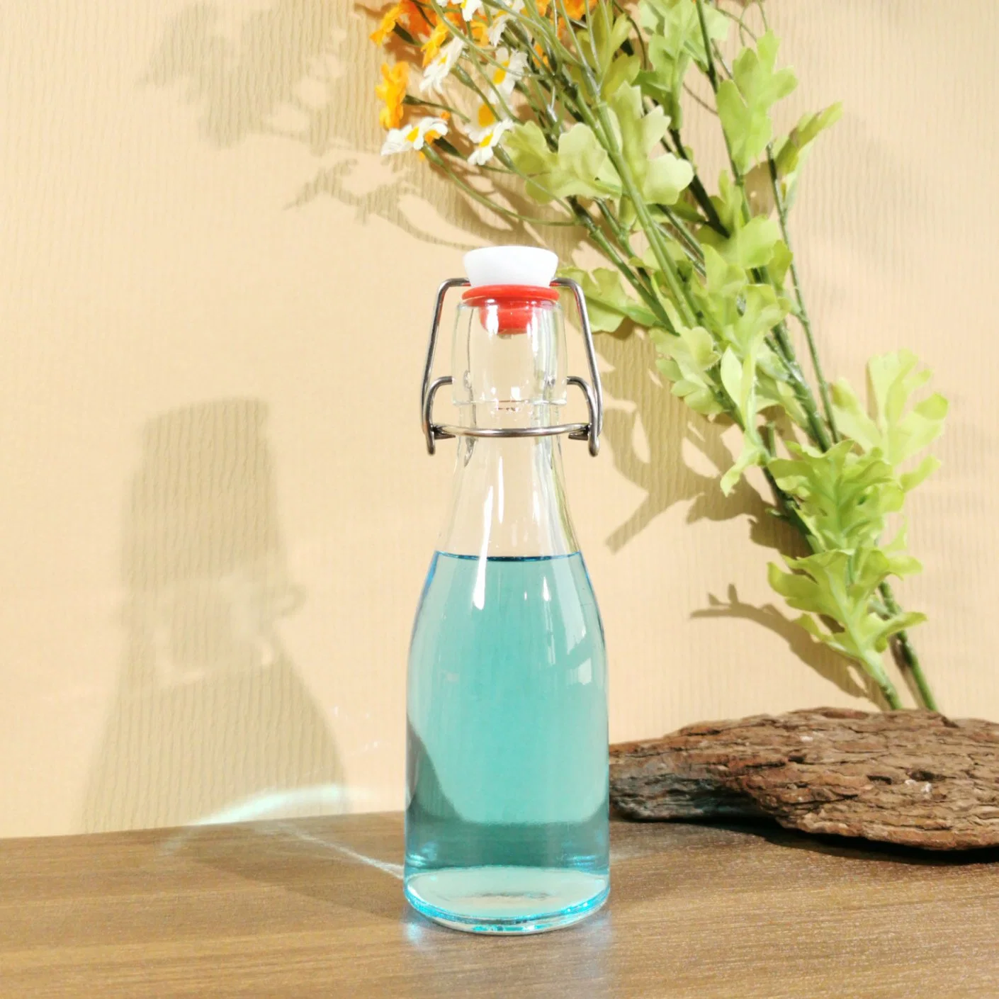 Wholesale Round Swing Top Glass Bottles Flip Top Leak Proof Water Bottles