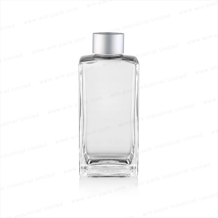 Special Shape Glass Lotion Bottle Wholesale/Supplier with Bakelite Stopper Shiny Sliver Cap Mould Glass Bottle Serum Bottle Packaging Glass Cosmetic Bottle