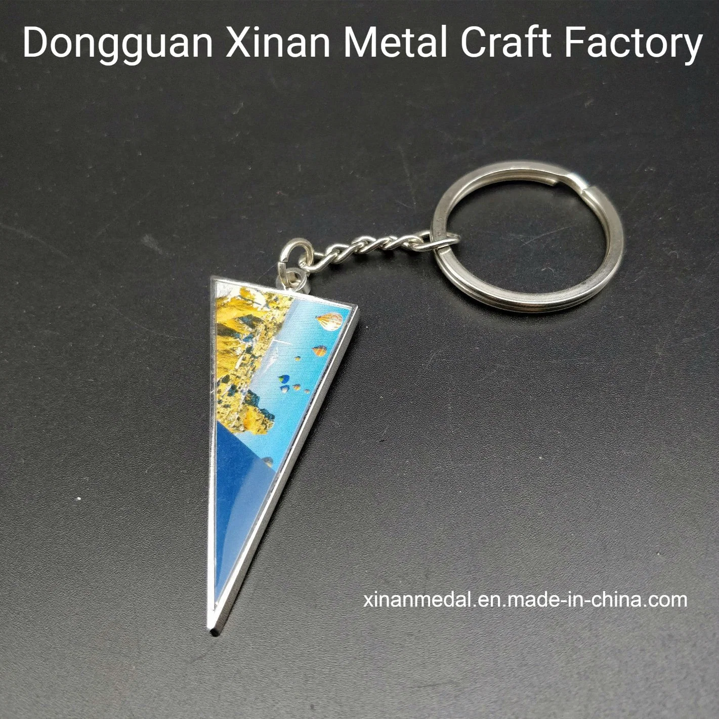 Fournisseur de porte-clés en métal or de Xinan Factory en Chine