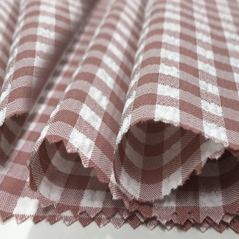 Made in China New Cationic Polyester Elastic Bubble Wrinkle Laid Stripe Fabric Ladies Casual Wear Fabric Spot Wholesale/Supplier