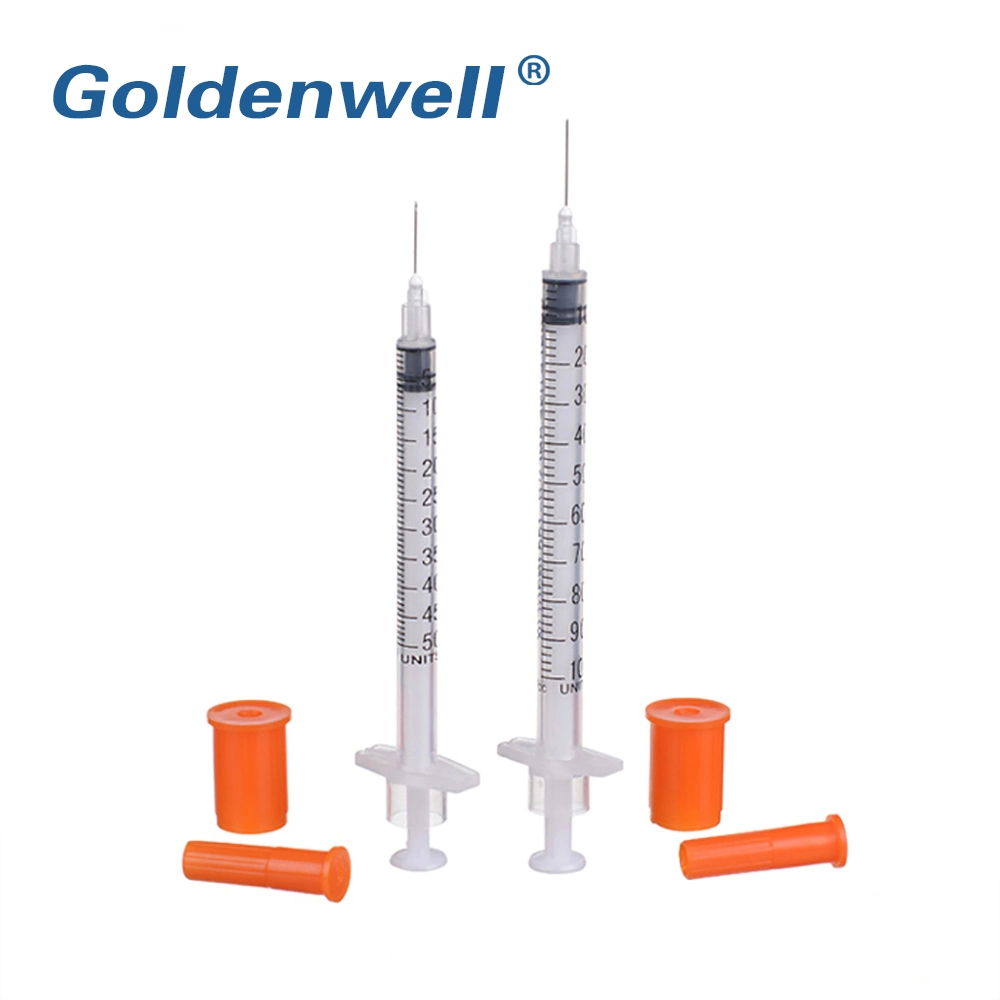 Médicos desechables colores jeringa estéril de insulina con tapa naranja y la aguja