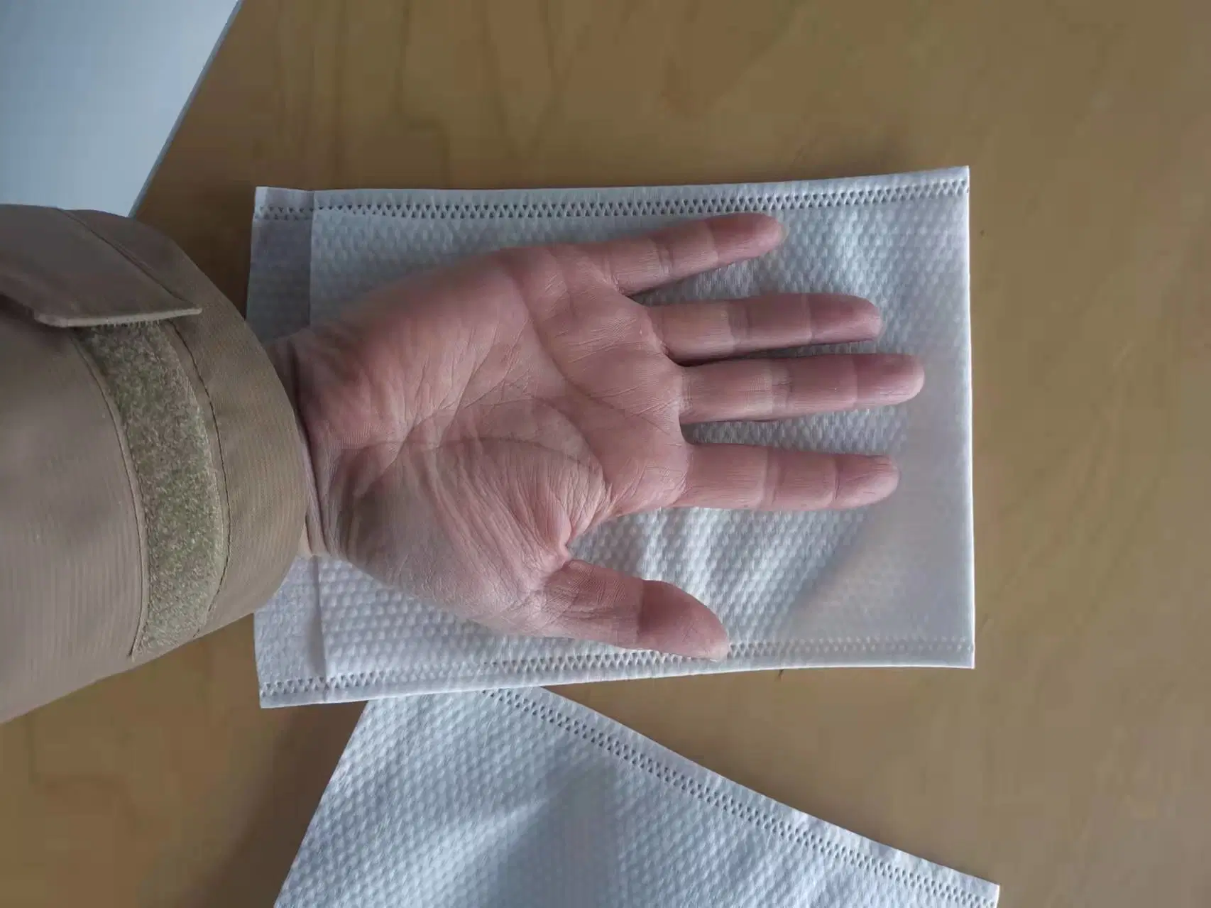 Paciente Fingerless desechables Nonwoven lavado mitones cuadrado Tamaño Europa