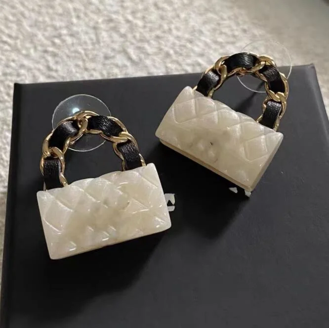 High quality/High cost performance  Silver Needle Light Luxury Earrings Bag Shape Buckle Rhombus Plaid Fashion Retro Stud Earrings