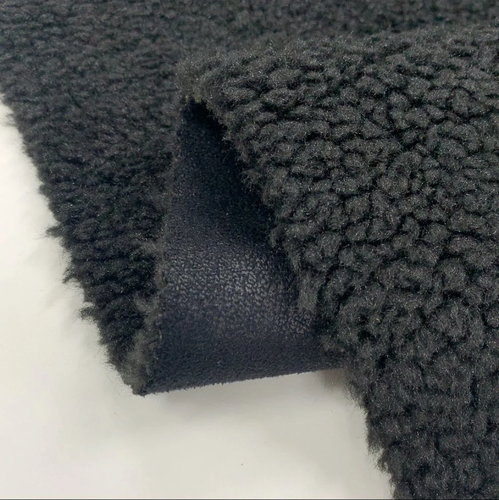 Fabricante China de caparazón blando Cordero grabado Sherpa Faux Fur tela con Suede Pegado de tela para untar