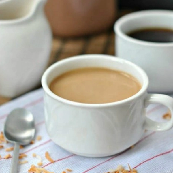 Crème crémeuse non laitière préférée et populaire en poudre blanche et crémeuse Couleur pour les boissons au café