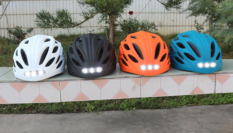 Casque de vélo avec lumière LED rechargeable, casque de cyclisme intégralement moulé pour une pratique sportive sûre en montagne ou sur route.