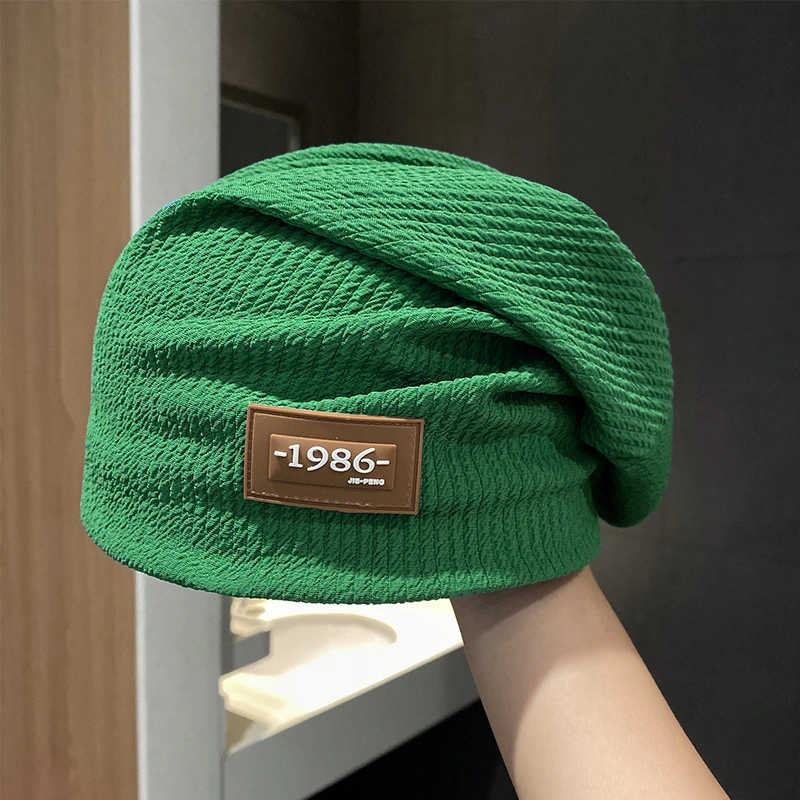 High Qualtiy Thin Breathable Leisure Knitted Loose Beanie Hat with Custom PVC Label