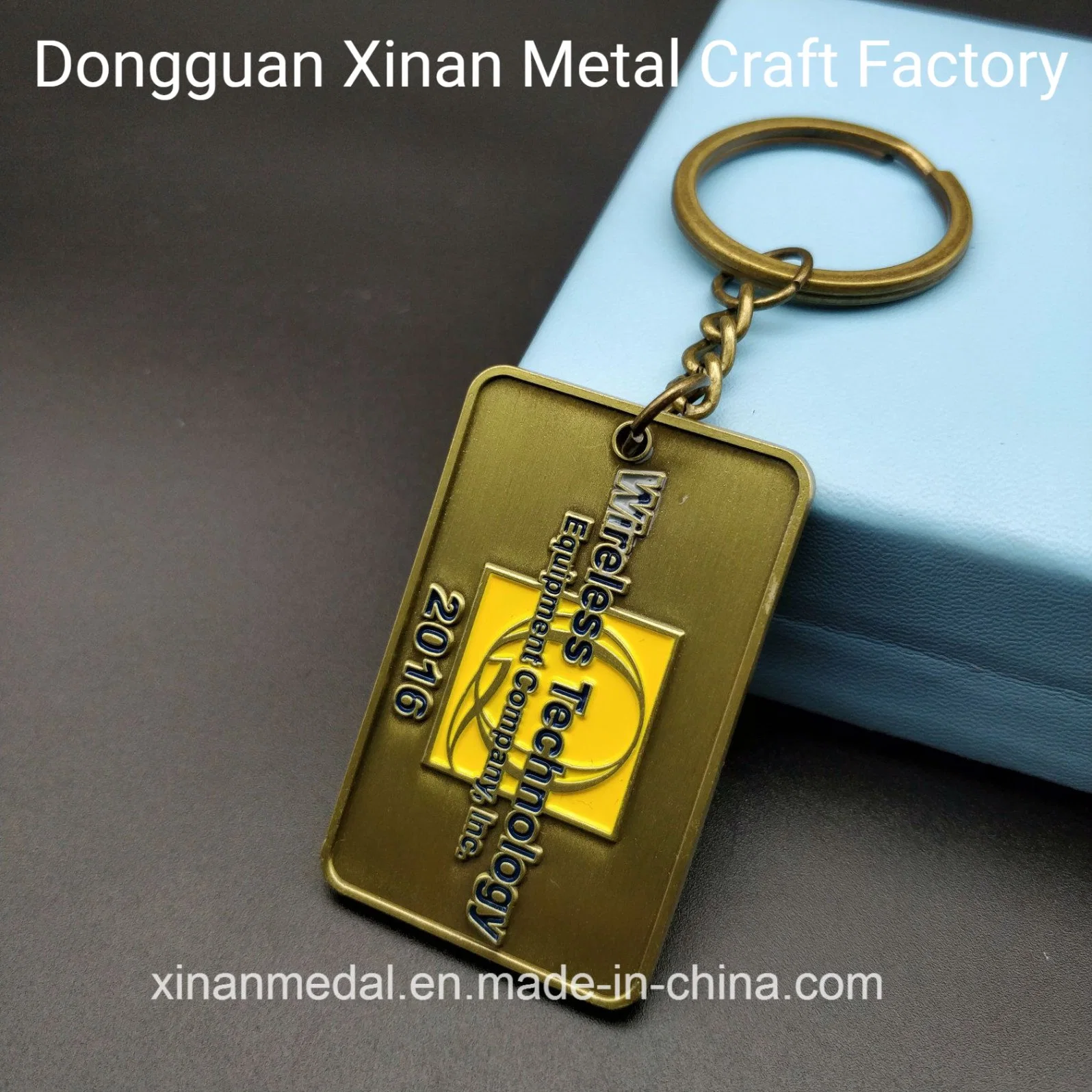 Xinan Factory Metal Gold Keychain China Proveedor