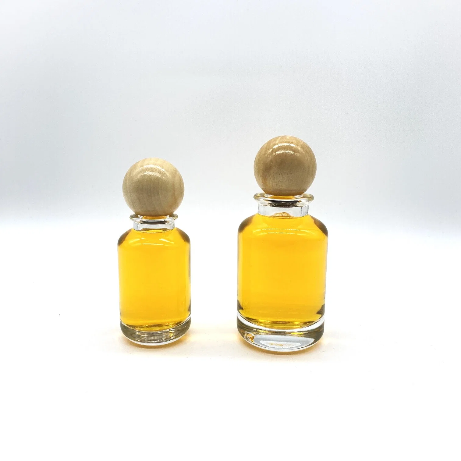 Bouteille de parfum en verre cylindrique de 50 ml 100 ml avec bouchon en bois rond