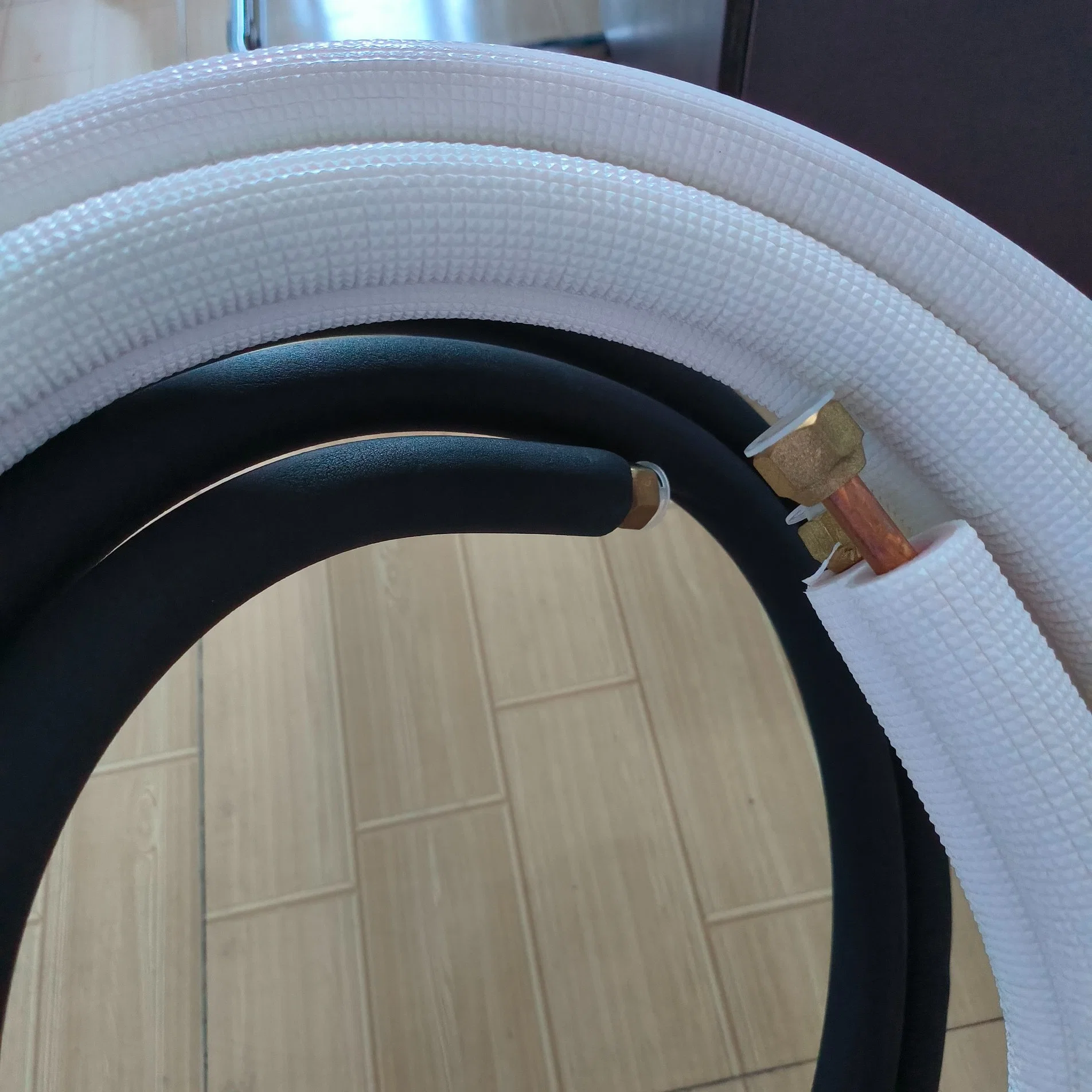 Professional Manufacturer of Air Conditioning Spare Parts White PE Pre-Insulated Copper Pipe