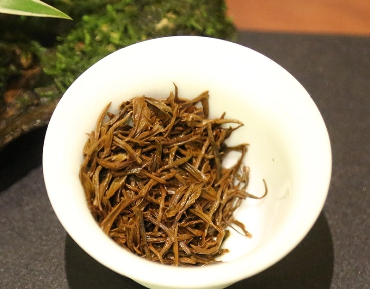 El té negro Tongmuguan Jinjunmei Aroma Durazno miel