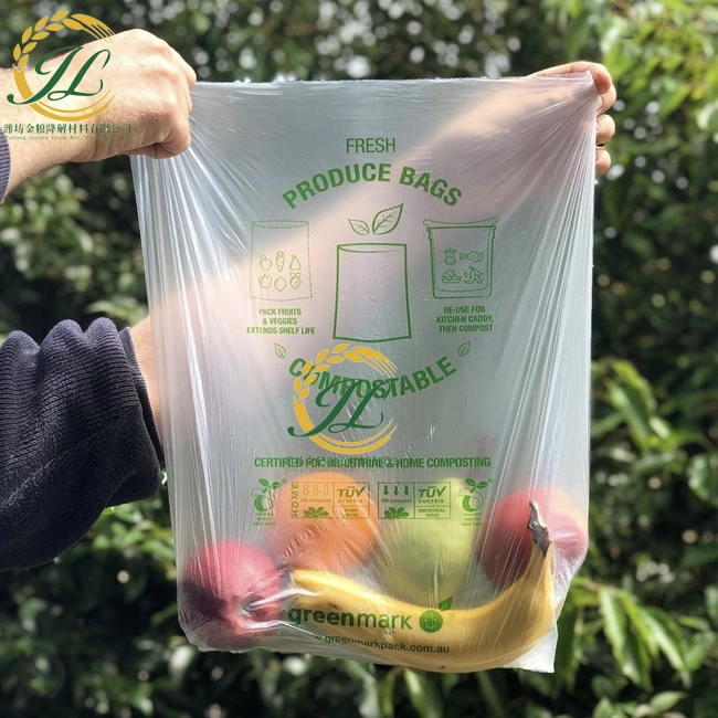 Custom supermercado Biodegradable PLA Pbat Compostable frutas y verduras de la producción de alimentos en el rollo de la bolsa de embalaje de fruta de color personalizado