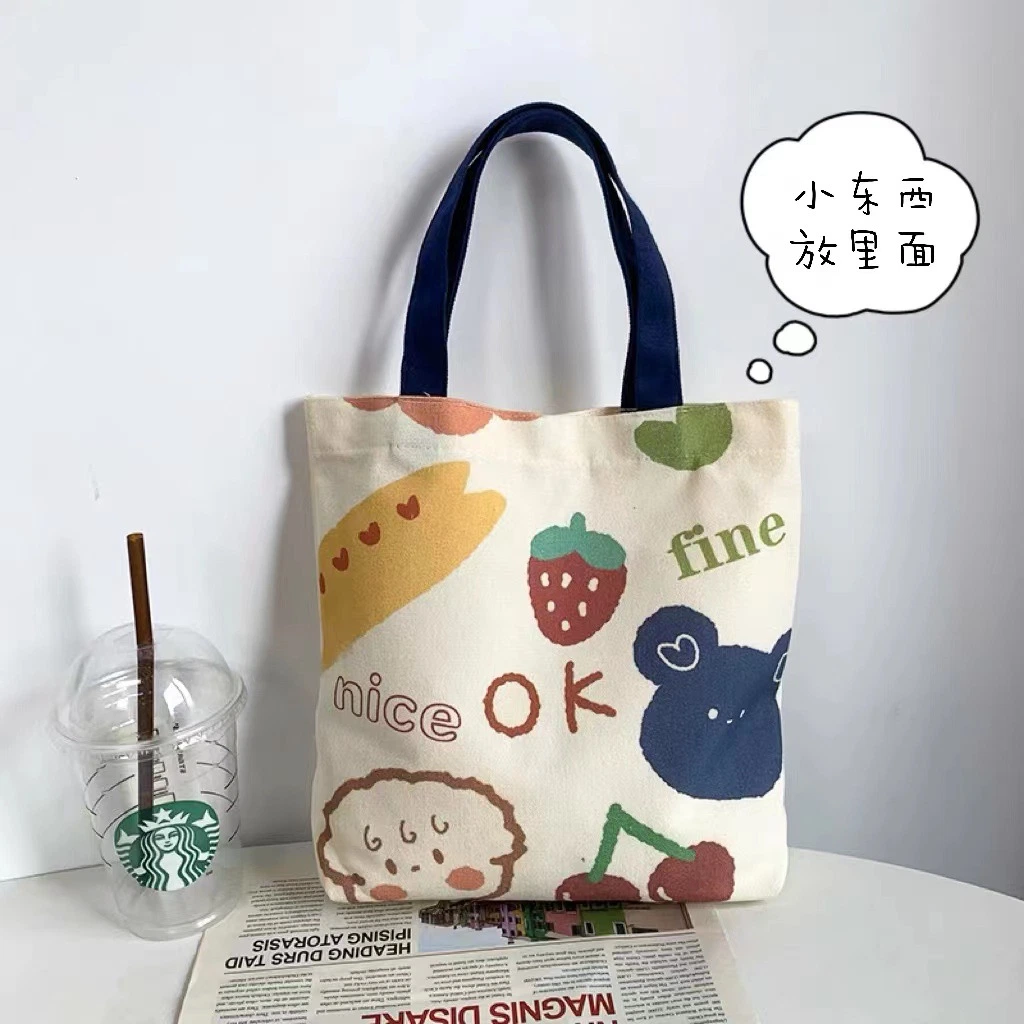 Wholesale/Supplier Kids' High quality/High cost performance  Fashionable Cartoon Print Colour Canvas Tote Bag Shopping Bag for Student Lunch Cylinder Bento Bag