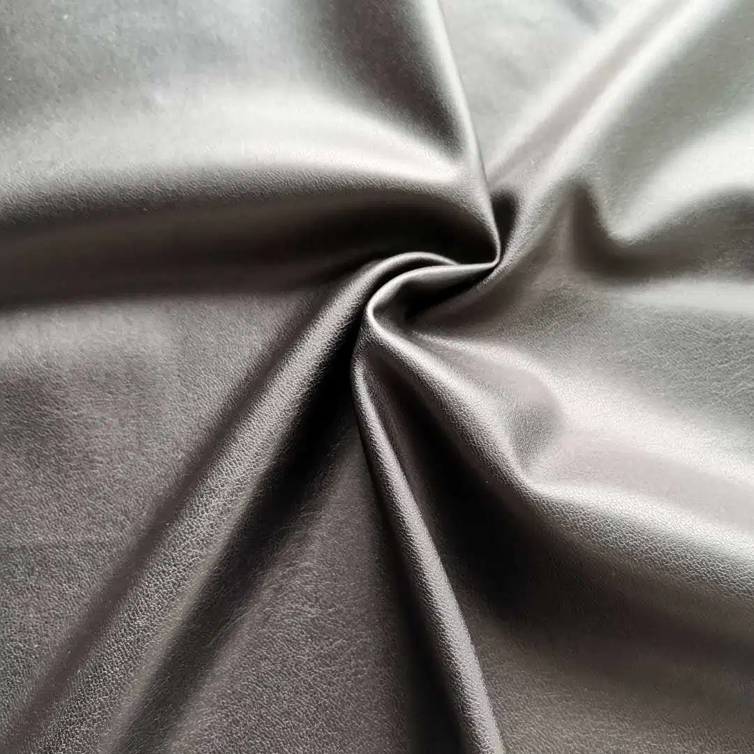 Manufacturer Light Weight Synthetic PU Leather Fabric with Soft Hand-Feel for Trench Coat