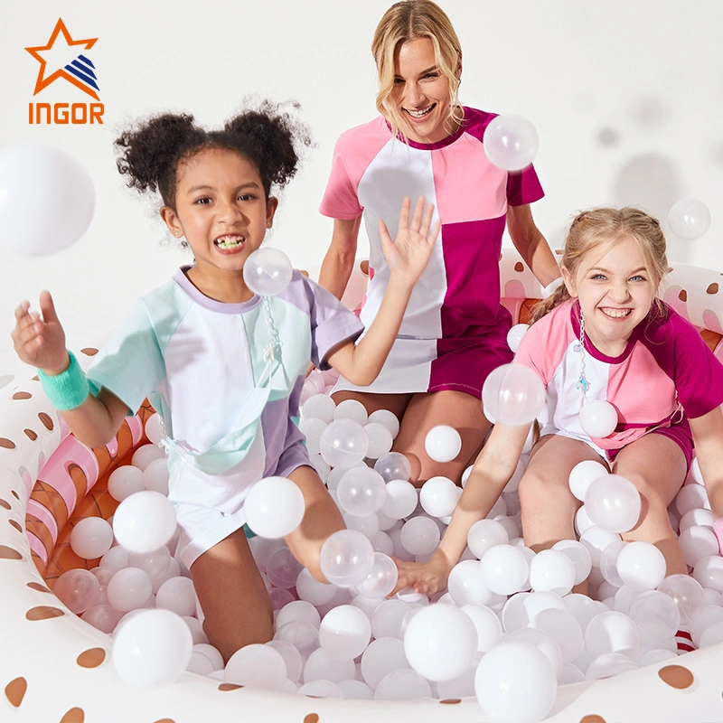 Ingorsports mayorista Activewear personalizado a los niños el color de contraste T-Shir Falda causal para niños ropa deportiva