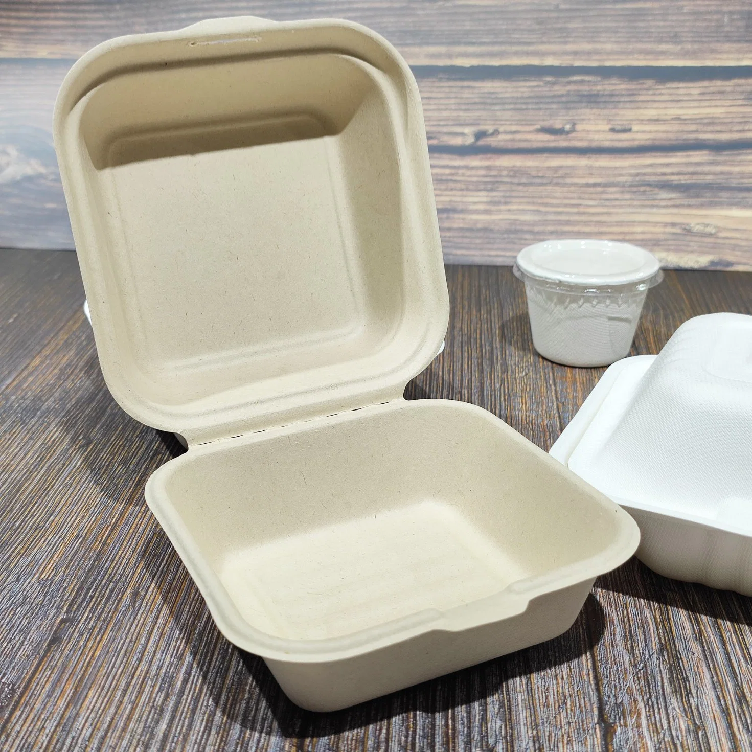 Envases desechables biodegradables para comida para llevar Caja fuerte para microondas y congelador Cajas de hamburguesa de bagazo de caña de azúcar