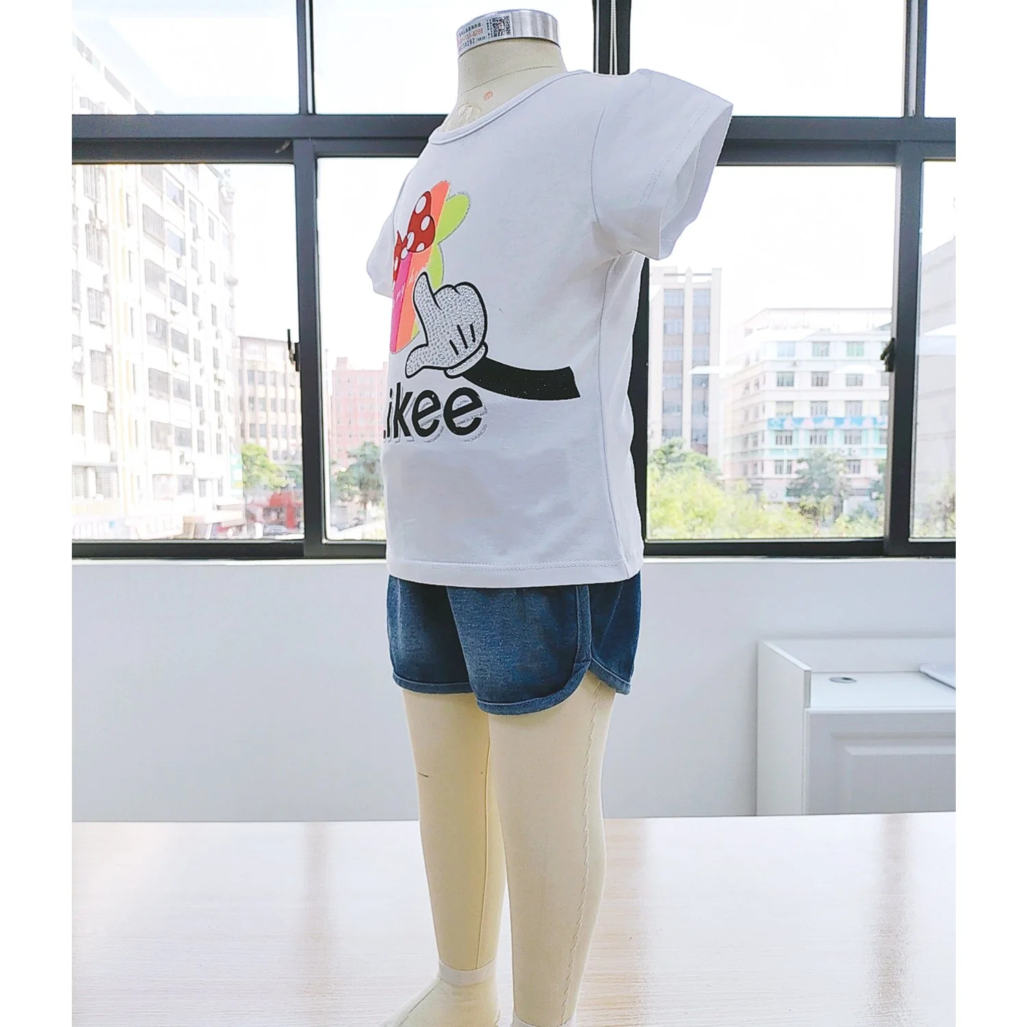 Les enfants de femmes de coton à manches courtes s'adapter à l'été T-Shirt Korean Style de vêtements Les vêtements pour enfants