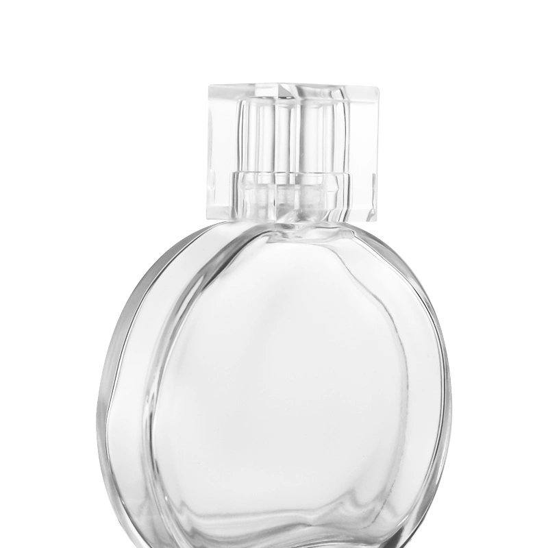 Wholesale/Supplier Grace Round Different Capacity Scent Cosmetics Packaging Glass Perfume Bottle with Lid