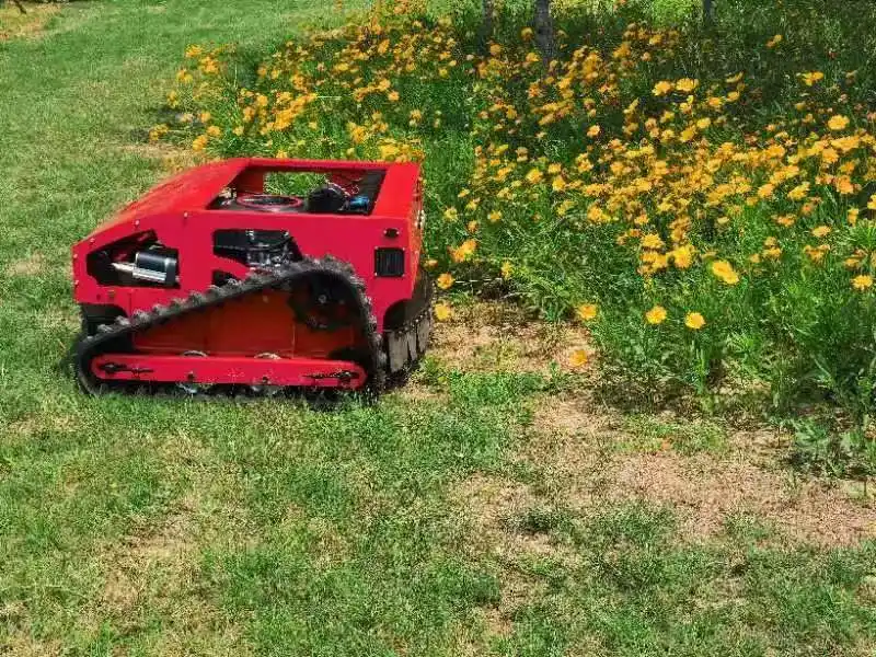 Véhicule à chenilles en caoutchouc de l'essence du robot automoteur Jardin tondeuse à gazon de commande à distance pour la vente