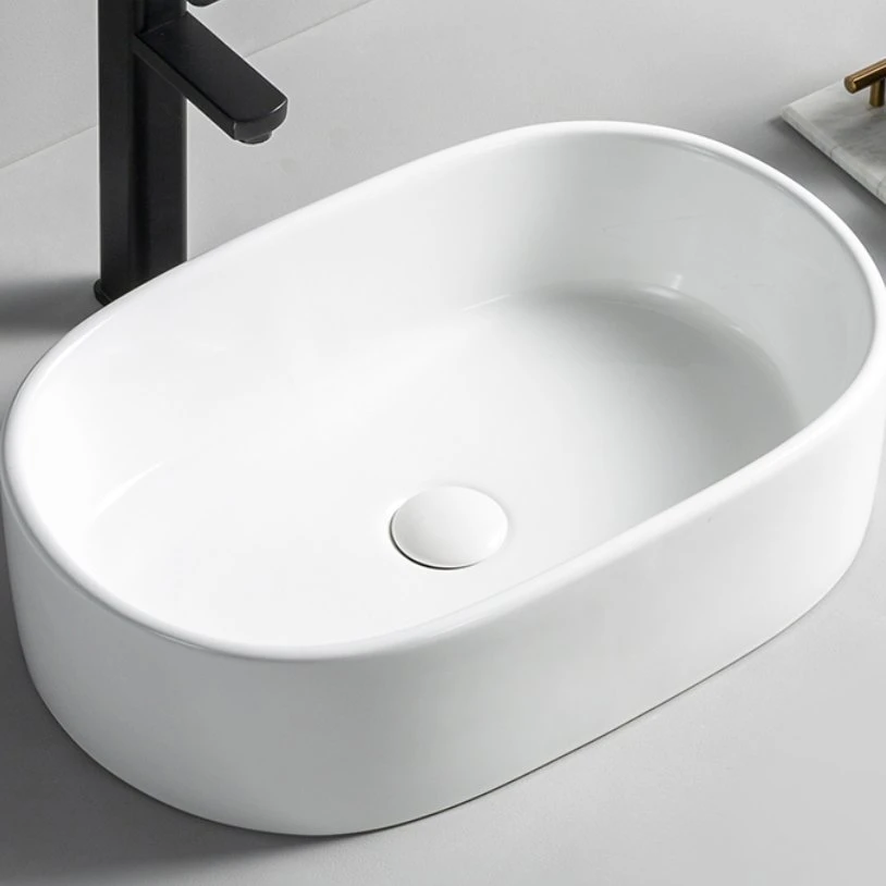 Rendimiento de alta calidad/alto costo sin agujero Ceramic Oval Cuarto de baño lavabo Mesa Lavabo de lavado de manos superior