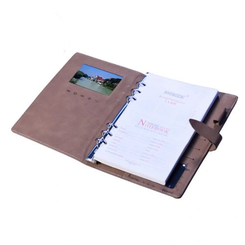 Personigezogenes Notebook aus PU-Leder mit LCD-Videodisplay