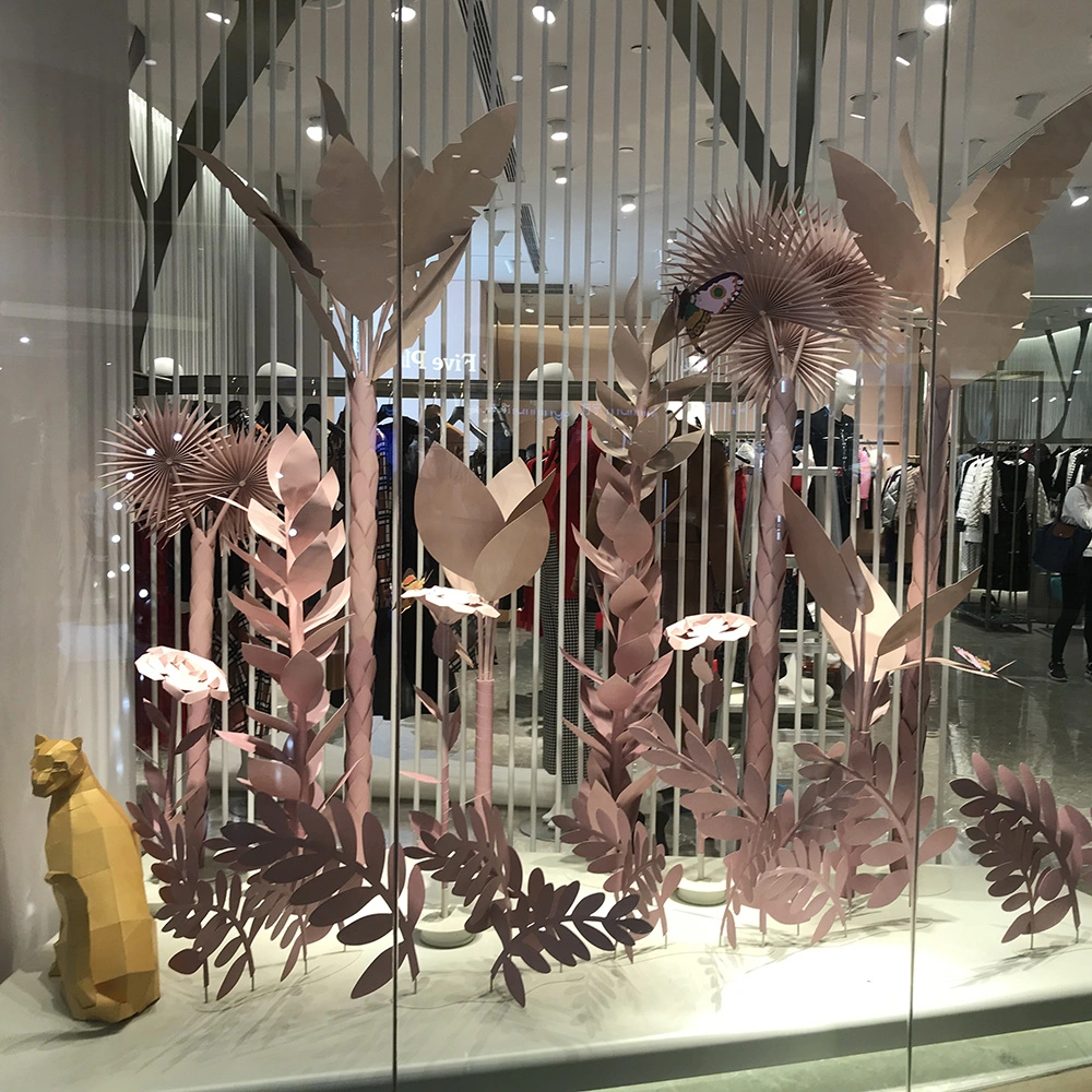 Conçu spécialement pour la marque de créations artisanales de fleurs géantes, le design créatif de fleurs géantes pour la vitrine.