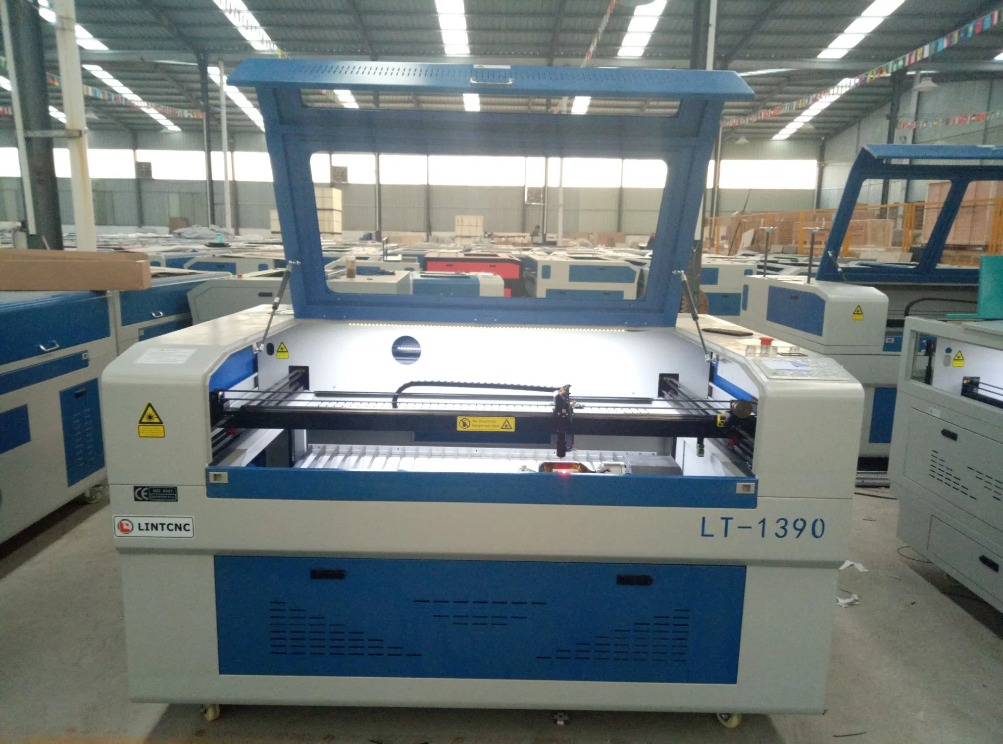 Auto Feeding 3D CO2 Laser Cutter Engraving Machine for Fabric Rubber Plywood Glass Acrylic CNC Laser Cutting Machine