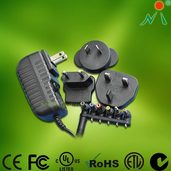 Adaptateur secteur universel avec fiches interchangeables.