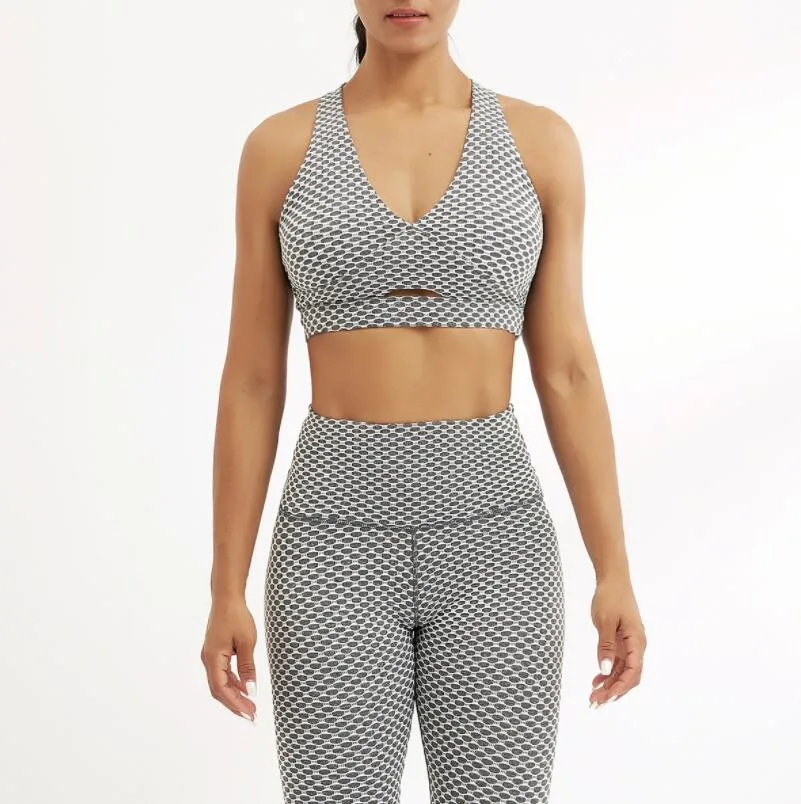 Wholesale/Supplier New Arrival Ribbed Fabric Women Fashion Two Piece Sexy Yoga Crop Top Bra with Legging Suit Sets