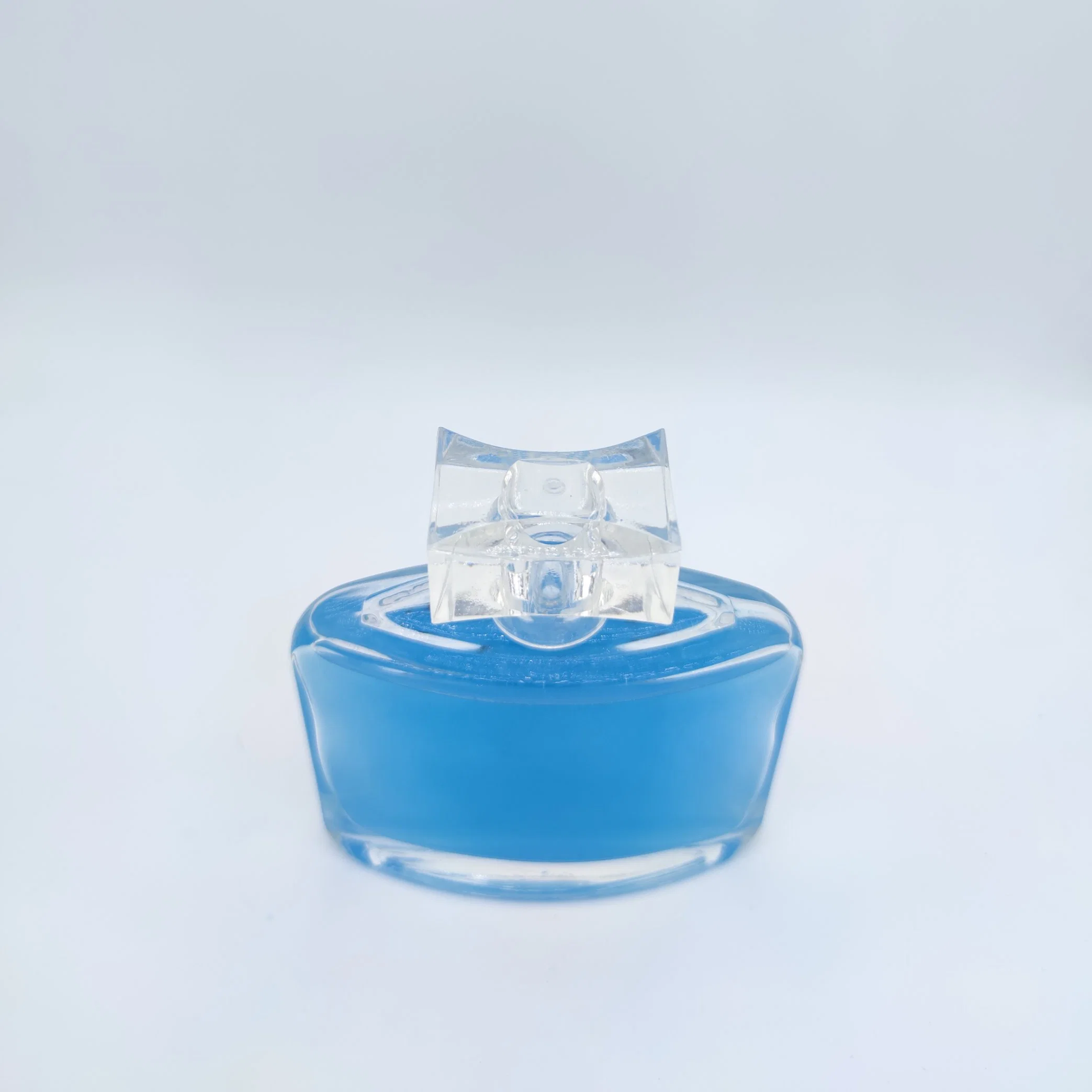 New Design Oval Shape Super Crystal Blue Glass Perfume Packaging Bottle Cosmetics Packaging Household Spray Bottles with Pump