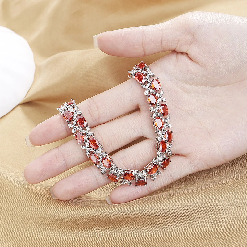 Pulsera de circón rojo sangre de pichón Four-Leaf temperamento doble capa Textura Pulsera Joyería