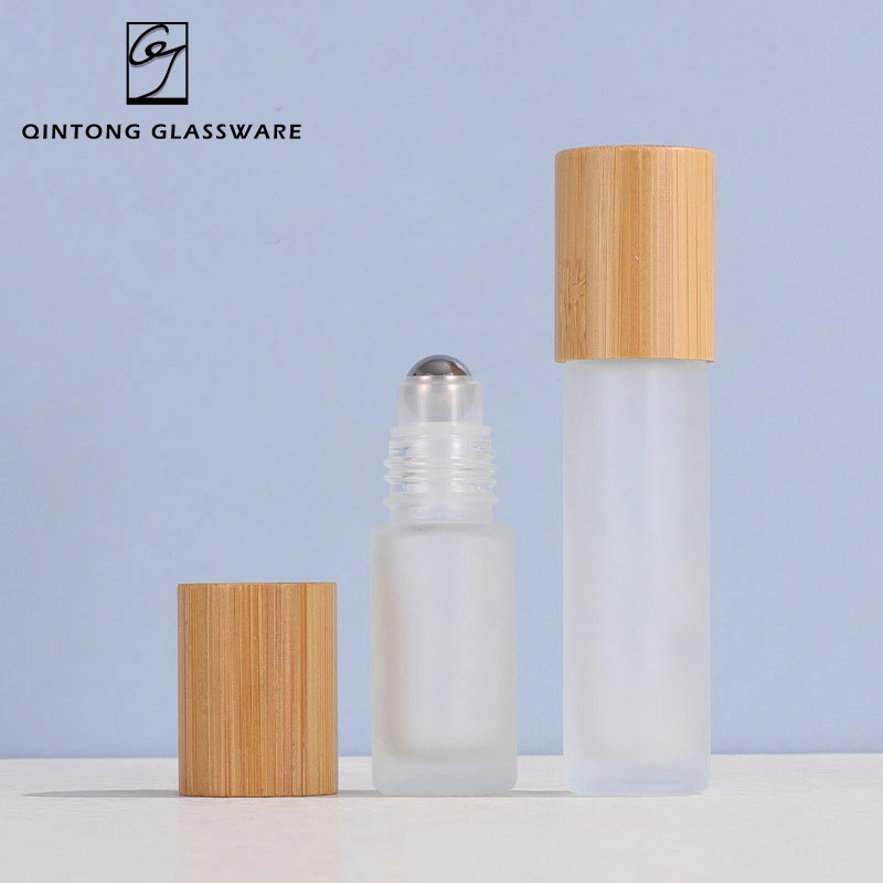 Factory Price 5ml 10ml 15ml Environmentally Friendly Matte Glass Cosmetics Packaging Perfume Glass Essential Oil Bottle with Bamboo Lid and Roller Ball