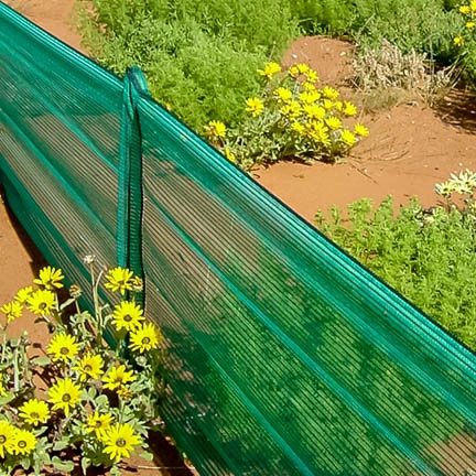 Dark Green Windbreak Mesh (50%) with Eyelets for Sheltering Against Wind and Strong Sunlight.