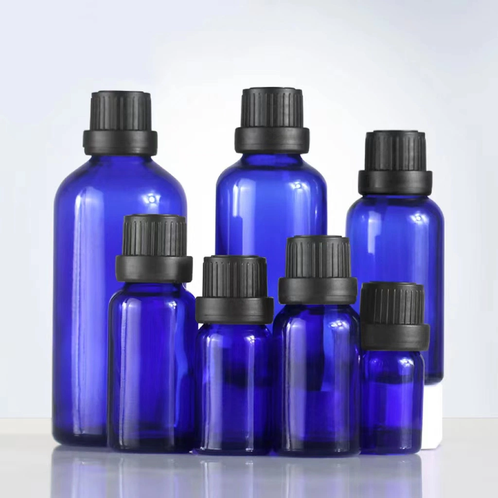 Raw Material Blue Glass Essential Oil Bottle with Plastic Child-Proof Cap