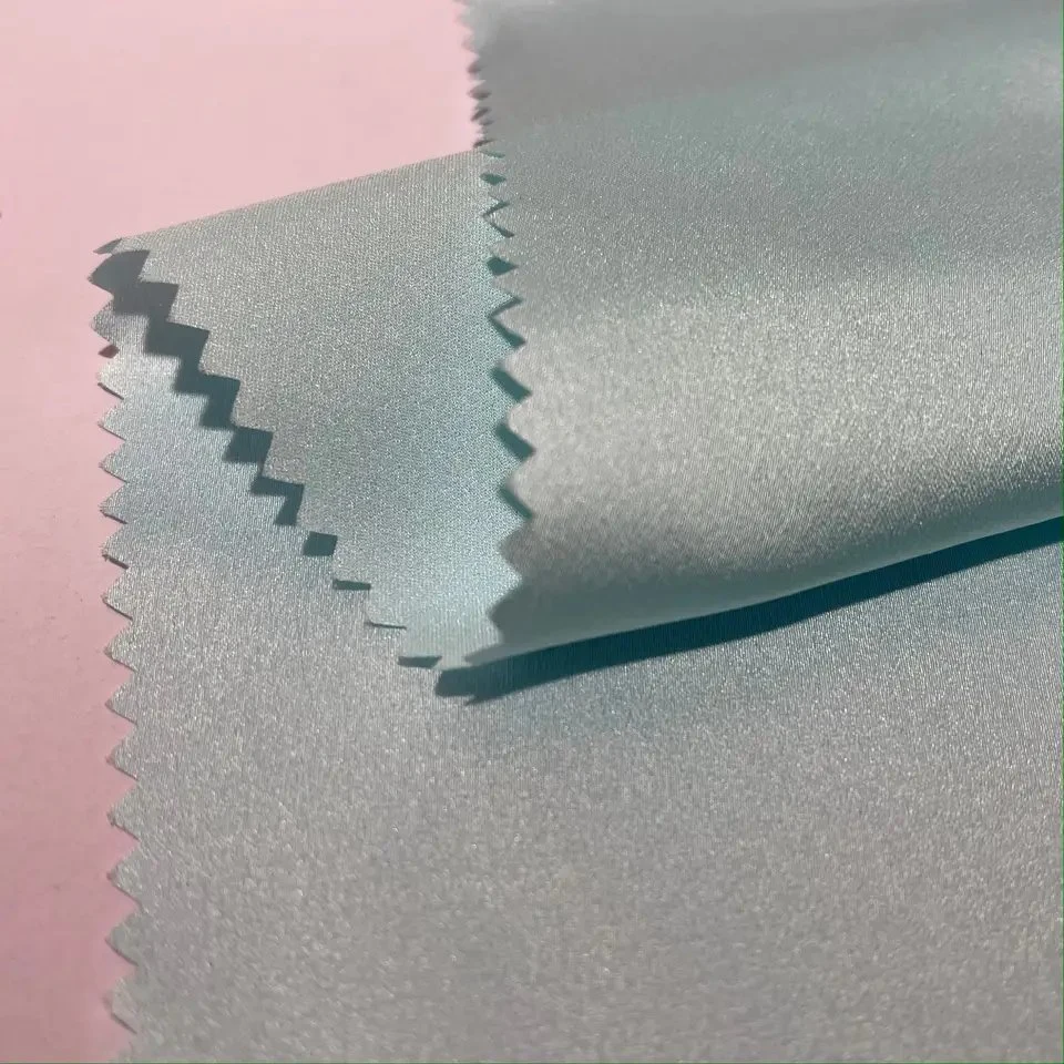 Fábrica china de poliéster de alta calidad 100%con tela satinada tramo técnico para pantalones
