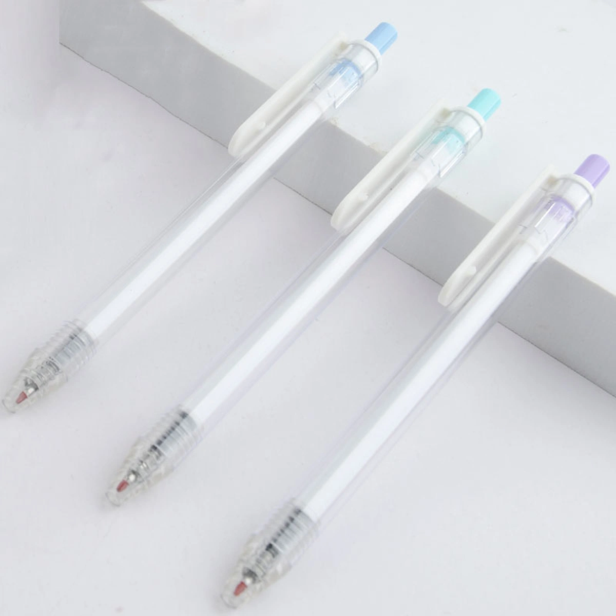 Fancy OEM Cheap Plastic Transparent Promo Smooth Writing Ball Pen