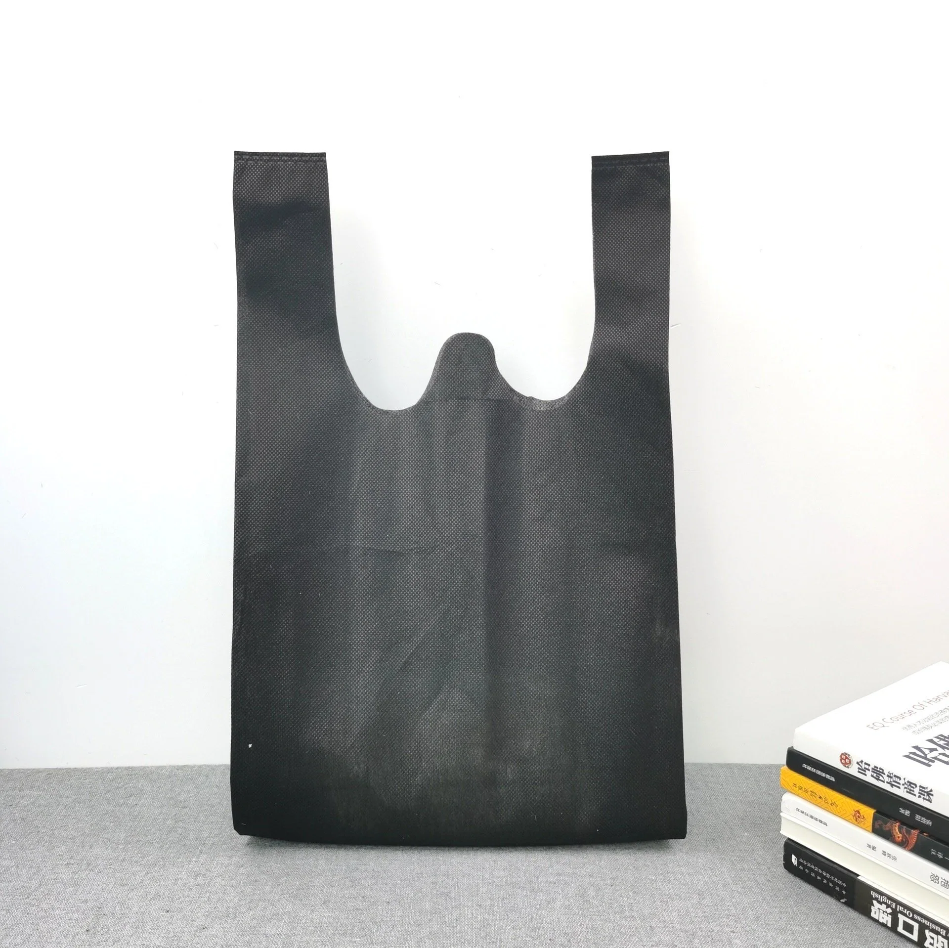 Wholesale/Supplier Eco-Friendly Hot Sale Non-Woven Supermarket Vest Shopping Bag Non Woven Tote Bag Handbags Gift Bag Souvenir Bags for Logo