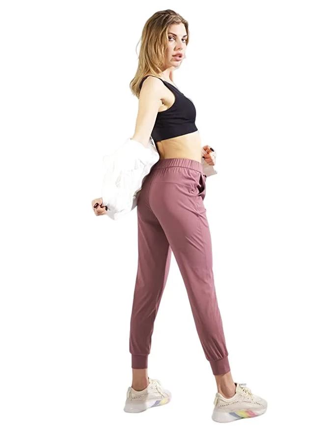 La formación de las mujeres Sweatpants Sportswear Yoga pantalones pantalones emparejador de China al por mayor precio de fábrica disponibles para la ropa personalizada